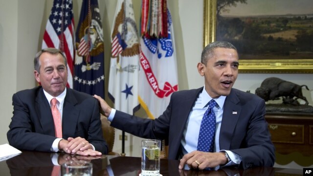 Predsednik Predstavničkog doma Džon Bejner i predsednik Barak Obama (arhivski snimak)