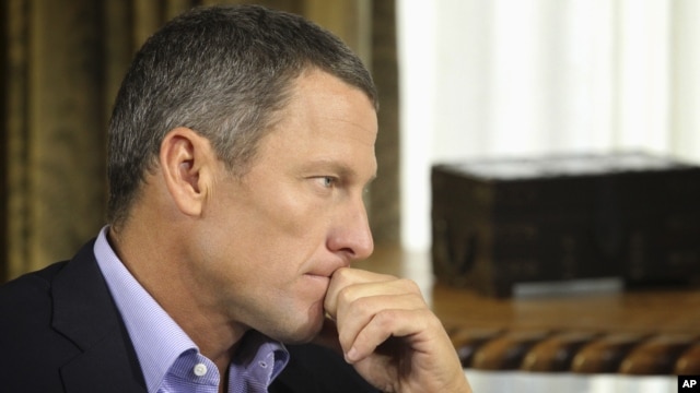 In this January 14, 2013 photo provided by Harpo Studios Inc., cyclist Lance Armstrong listens to a question from Oprah Winfrey during taping for the show "Oprah and Lance Armstrong: The Worldwide Exclusive" in Austin, Texas. 