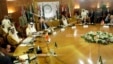 Arab League secretary-general Nabil Elaraby, fourth left, chairs an Arab League committee emergency meeting on Syria at the league’s headquarters in Cairo, Egypt, Thursday, May 23, 2013, ahead of an international peace conference to end the country’s civi