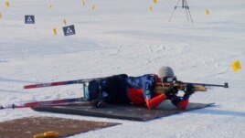 U.S. Paralympic National Team member Sean Halsted competes in the biathlon, which combines cross country skiing and target shooting. (VOA/T.Banse)
