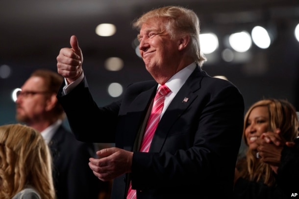 Campaign 2016 Trump: Republican presidential candidate Donald Trump gives a thumbs up during a church service at Great Faith Ministries, Saturday, Sept. 3, 2016, in Detroit.