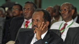 Somalia's newly elected President Hassan Sheikh Mohamud listens to proceedings after winning the election, in Mogadishu, September 10, 2012.