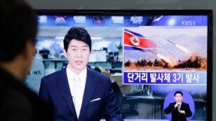 A South Korean man watches a TV news reporting missile launch conducted by North Korea, in Seoul, South Korea, Saturday, May 18, 2013. 
