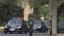 A car, second from left, believed to be carrying North Korean envoy Choe Ryong Hae, is escorted by a convoy of cars as it leaves Beijing's Diaoyutai State Guesthouse, May 24, 2013. 