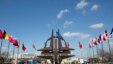 FILE - The NATO symbol and flags of the NATO nations outside NATO headquarters in Brussels, March 2, 2014. Officials from NATO and Russia are scheduled to hold their first formal meeting in almost two years, covering Ukraine, the security situation in Afghanistan, and military activities, the Western alliance said Tuesday.