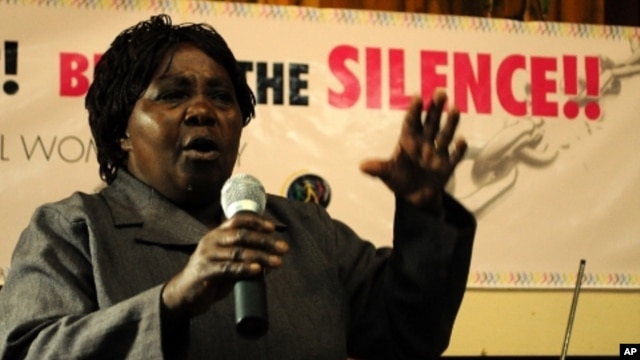 A relative of a victim of extrajudicial killings recounts her experience at a rally in Nairobi, March 8, 2011