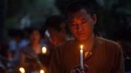 Tibetan exiles hold candlelight vigil for those who have recently self-immolated, Dharmsala, India,  May 31, 2012.