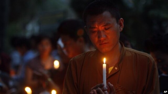 Tibetan exiles hold candlelight vigil for those who have recently self-immolated, Dharmsala, India,  May 31, 2012.