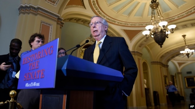 FILE - Senate Majority Leader Mitch McConnell of Kentucky speaks to reporters on Capitol Hill in Washington.