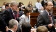 Director of Exempt Organizations for the Internal Revenue Service Lois Lerner (C) departs with her legal team after being excused from a House Oversight and Government Reform Committee hearing on targeting of political groups seeking tax-exempt status fro