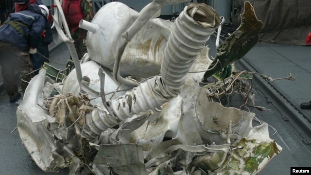 An undated image released by South Korea's Defense Ministry in Seoul, shows that a piece of wreckage of North Korea's Unha-3 (Milky Way 3) on a navy vessel of South Korean navy. 