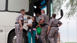 Migrants who enter the U.S. illegally may need legal representation which can be expensive. (Phoenix, Arizona May 2014)