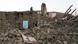 Ruins of a building in a village near the city of Varzaqan in northwestern Iran, after an earthquake, Aug. 13, 2012.  