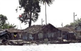 In the Niger Delta region, multi-billion dollar oil installations sit among villages of shacks perched on stilts over viscous, blackened water.