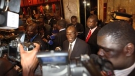 Zimbabwean President Robert Mugabe (C) briefs journalists after meeting with Prime Minister Morgan Tsvangirai and South African President Jacob Zuma on the progress made on the implementation of The Global Political Agreement ahead of anticipated election