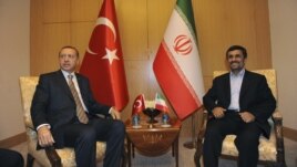 Iran's President Mahmoud Ahmadinejad (R) meets with Turkey's Prime Minister Recep Tayyip Erdogan in Istanbul, May 9, 2011.