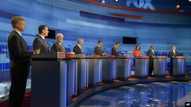 Republican presidential candidates from left, former New Mexico Governor Gary Johnson, former Pennsylvania Senator Rick Santorum, former House Speaker Newt Gingrich, Rep. Ron Paul, Texas Gov. Rick Perry, former Massachusetts Governor Mitt Romney, Rep. Mic