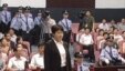 中央电视台画面显示薄熙来妻子谷开来(中间站立者)2012年8月9日在中国东部的合肥市中级人民法院出庭受审。( AP Photo/CCTV )