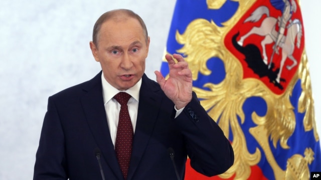 Russian President Vladimir Putin speaks during a state-of-the-nation address in Moscow, Russia,  Dec. 12, 2012.