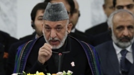 Afghan President Hamid Karzai speaks during an opening session at the Tokyo Conference on the Reconstruction of Afghanistan, in Tokyo, Japan, July 8, 2012. 