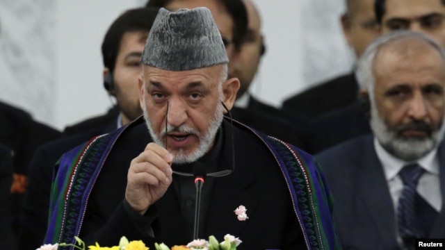 Afghan President Hamid Karzai speaks during an opening session at the Tokyo Conference on the Reconstruction of Afghanistan, in Tokyo, Japan, July 8, 2012. 