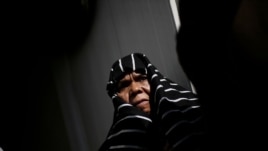 Libyan Tawergha woman is seen in a refugee camp at the outskirts of Benghazi, Libya, March 7, 2012.