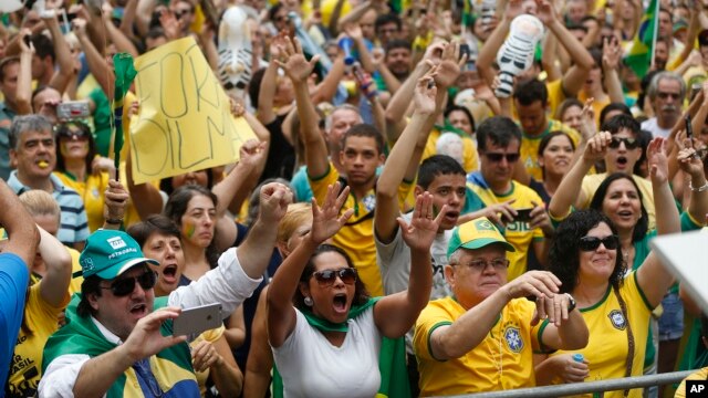Demonstrators gather along Paulista Avenue  during a protest demanding the impeachment of Brazil's President Dilma Rousseff in Sao Paulo, Brazil, Sunday, March 13, 2016. (AP Photo/Andre Penner)