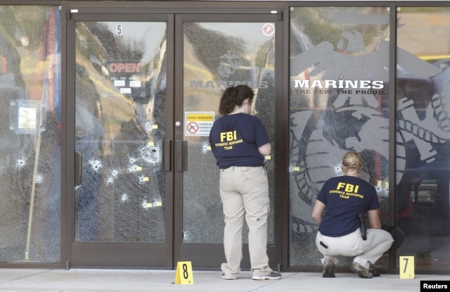 FBI agents work the scene at the Armed Forces Career Center in Chattanooga, Tennessee, July 16, 2015.