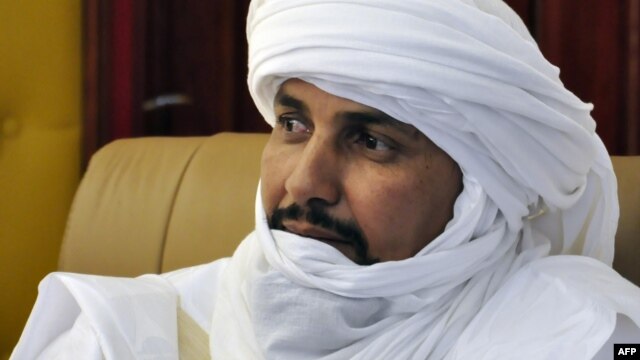 Alghabass Ag Intalla, leader of the Ansar Dine delegation, attends a meeting with Tuareg leaders and lead negotiator Burkina Faso President Blaise Compaore, on November 16, 2012 in Ouagadougou. 