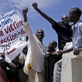 Hundreds of southern Sudanese take part in a demonstration against northern Sudan's military incursion into the border town of Abyei in the southern capital of Juba, Sudan, May 23, 2011