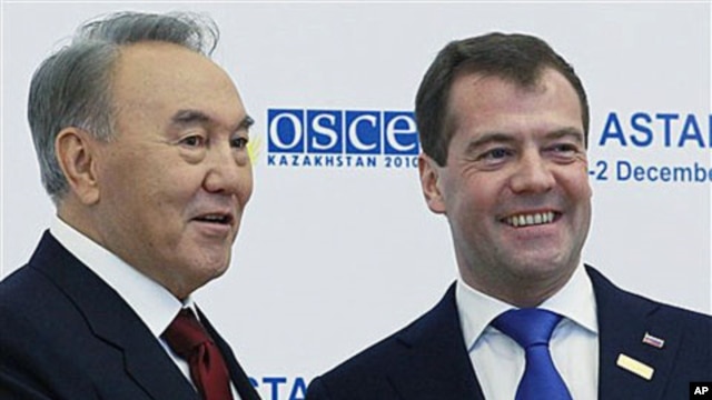 Russian President Dmitry Medvedev, right, and Kazakh President Nursultan Nazarbayev seen at the start of Organisation for Security and Cooperation in Europe meeting in Astana, Kazakhstan's capital, Dec. 1, 2010