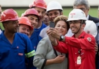 Dilma Roussef and construction workers.