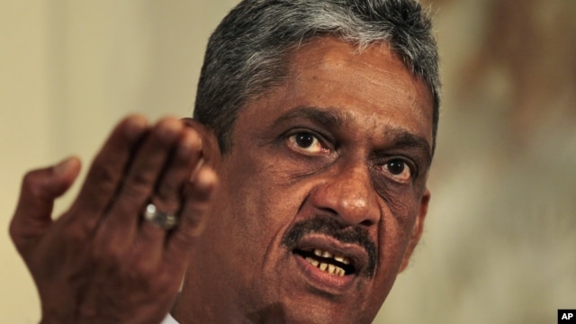 Sri Lanka's former army chief Sarath Fonseka gestures while speaking during a media briefing in Colombo, Sri Lanka, June 14, 2012.
