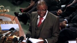 Zimbabwe's Finance Minister Tendai Biti delivers his speech about the 2013 budget at the Parliament in Harare, Zimbabwe, November 15, 2012.