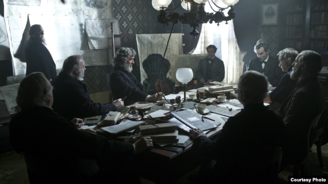 President Lincoln (Daniel Day-Lewis, far right) meets with his Cabinet to discuss the planned attack on Fort Fisher in this scene from director Steven Spielberg's drama "Lincoln" from DreamWorks Pictures and Twentieth Century Fox.