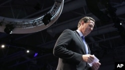 Republican presidential candidate Rick Santorum leaves the stage after speaking before the American Israel Public Affairs Committee (AIPAC), in Washington, March 6, 2012. (AP)