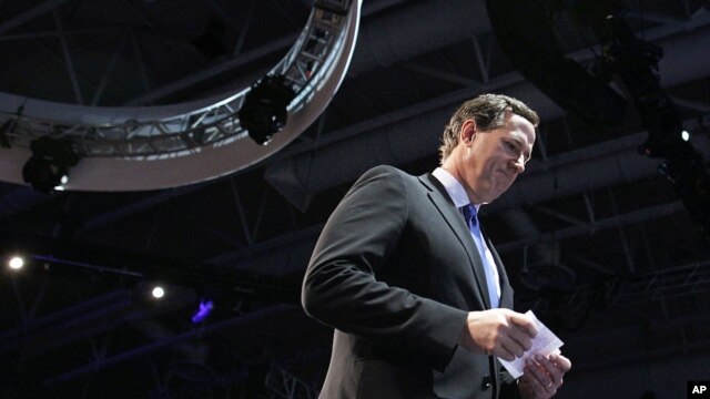 Republican presidential candidate Rick Santorum leaves the stage after speaking before the American Israel Public Affairs Committee (AIPAC), in Washington, March 6, 2012. (AP)