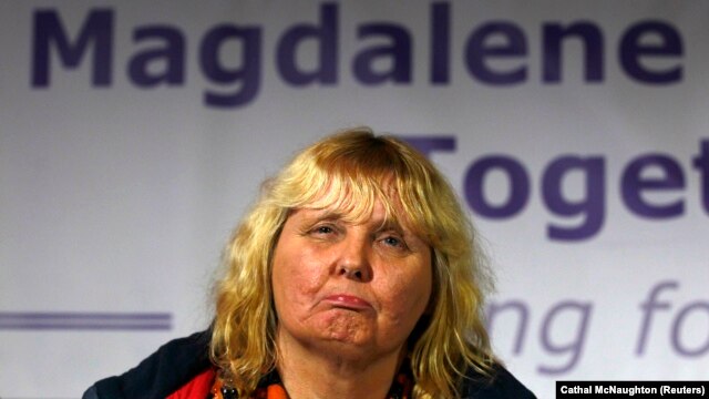 Mary Smyth who was born in a "Magdalene Laundry", reacts during a "Magdalene Survivors Together" news conference in Dublin, February 5, 2013.  