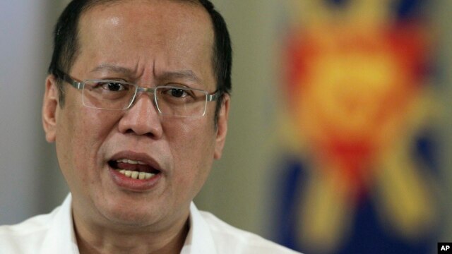 Philippine President Benigno Aquino III delivers a speech on national television at the Malacanang Presidential Palace in Manila, Philippines on Oct. 7, 2012.