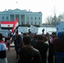 Demonstrators shout anti-Mubarak slogans in front of the White House, January 30, 2011