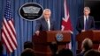 Defense Secretary Chuck Hagel, accompanied by British Defense Secretary Philip Hammond, addresses reporters following talks at the Pentagon, near Washington, May 2, 2013.