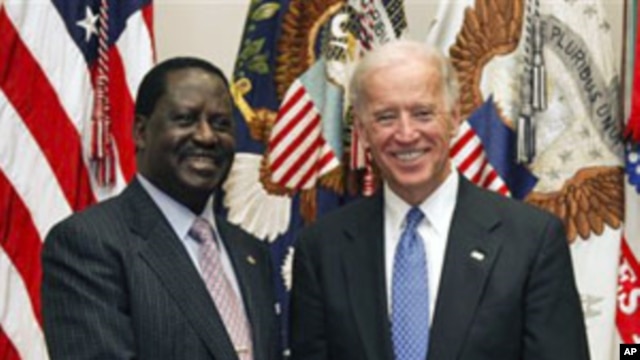 Vice President Joe Biden meets with Kenya's Prime Minister Raila Odinga, in the Roosevelt Room at the White House in Washington, April 12, 2011