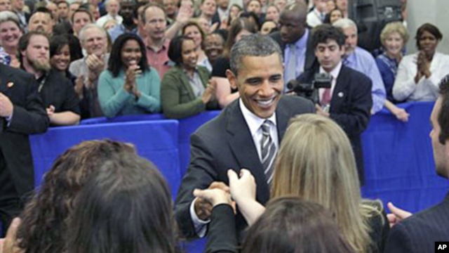 President Barack Obama shakes hands after speaking to CIA employees and thanking them for the years of effort that led to the discovery and killing of terrorist Osama bin Laden, at CIA headquarters in Langley, Va., May 20, 2011