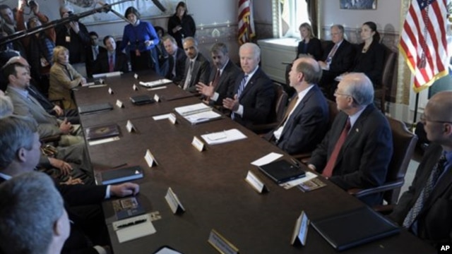 U.S. Vice President Joe Biden, center, meets  with sportsmen, wildlife groups, and members of the cabinet, Jan. 10, 2013.