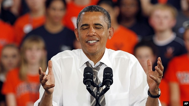 President Barack Obama shrugs during a rally in Charlottesville, Virginia, Aug. 29, 2012.  