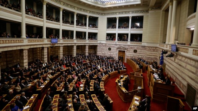 Greek lawmakers attend the third round of voting to elect a new Greek president at the Parliament in Athens, Dec. 29, 2014. Now a general elections is planned for January 25. (AP Photo/Thanassis Stavrakis)