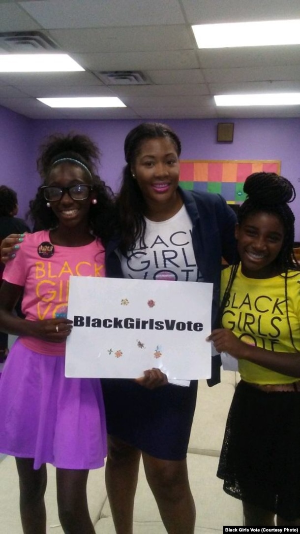 Nykidra “Nyki” Robinson (center) with two girls at a Black Girls Vote event.