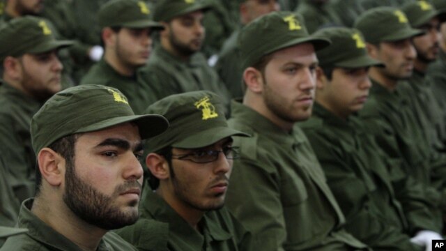 Milicianos de Hezbolá celebran el día del mártir en Beirut, Líbano.