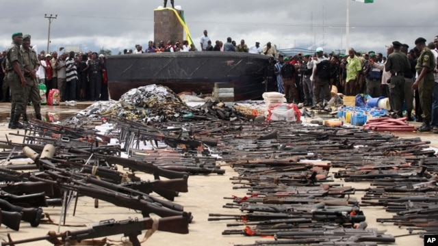 Police display weapons collected from Niger delta militants as part of a government amnesty program, Yenagoa, August 2009.