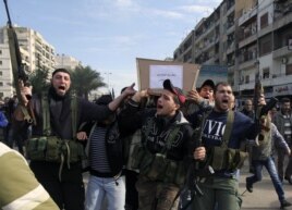 Lebanese Islamist gunmen fire their weapons as three bodies of other members of their group arrive from Syria, in Tripoli in northern Lebanon, December 9, 2012.